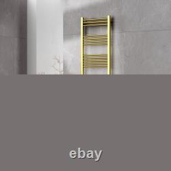 Radiateur de salle de bain doré et noir, échelle blanche et grise, chauffe-serviette chauffant